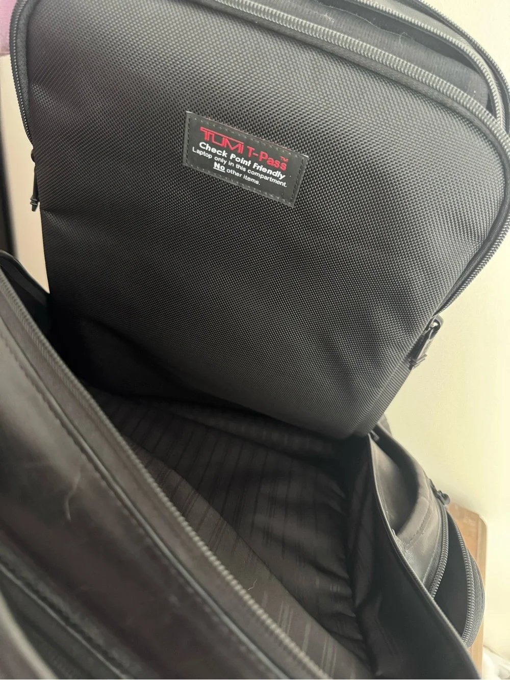 TUMI Black Leather Backpack